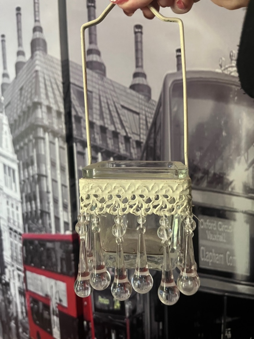 Two vintage metal hanging candle holders